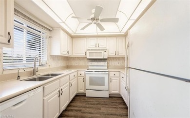 Prime second-floor 2-bedroom, 2-bath condo with in-residence on Royal Palm Golf Club in Florida - for sale on GolfHomes.com, golf home, golf lot