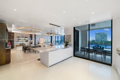 This elegantly designed 4-bedroom, 4.5-bath residence at Palazzo on Fisher Island Club in Florida - for sale on GolfHomes.com, golf home, golf lot