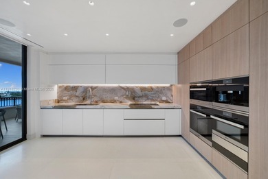 This elegantly designed 4-bedroom, 4.5-bath residence at Palazzo on Fisher Island Club in Florida - for sale on GolfHomes.com, golf home, golf lot