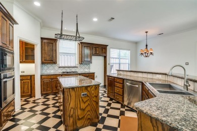 The meticulously maintained home sits inside a gorgeous gated on Hackberry Creek Country Club in Texas - for sale on GolfHomes.com, golf home, golf lot