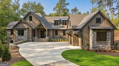 New Construction Masterpiece, nestled on Hole #1 of The Cove in on Reynolds Lake Oconee - The National  in Georgia - for sale on GolfHomes.com, golf home, golf lot