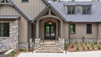 New Construction Masterpiece, nestled on Hole #1 of The Cove in on Reynolds Lake Oconee - The National  in Georgia - for sale on GolfHomes.com, golf home, golf lot