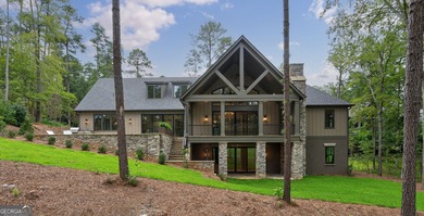 New Construction Masterpiece, nestled on Hole #1 of The Cove in on Reynolds Lake Oconee - The National  in Georgia - for sale on GolfHomes.com, golf home, golf lot