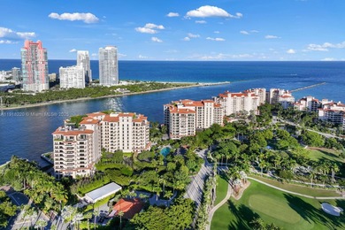 This elegantly designed 4-bedroom, 4.5-bath residence at Palazzo on Fisher Island Club in Florida - for sale on GolfHomes.com, golf home, golf lot