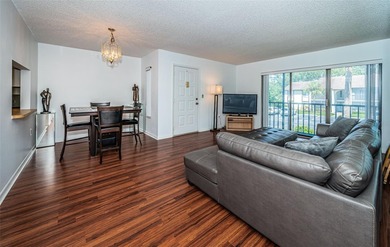 Welcome to your dream 55+ retirement retreat Located in Pine on Highland Lakes Executive Golf Course in Florida - for sale on GolfHomes.com, golf home, golf lot