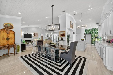 Tropical Oasis awaits! Welcome to your beautiful updated 4 on Boca Grove Golf and Tennis in Florida - for sale on GolfHomes.com, golf home, golf lot