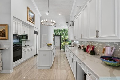 Tropical Oasis awaits! Welcome to your beautiful updated 4 on Boca Grove Golf and Tennis in Florida - for sale on GolfHomes.com, golf home, golf lot