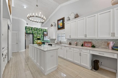 Tropical Oasis awaits! Welcome to your beautiful updated 4 on Boca Grove Golf and Tennis in Florida - for sale on GolfHomes.com, golf home, golf lot