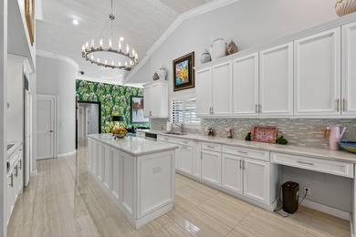 Tropical Oasis awaits! Welcome to your beautiful updated 4 on Boca Grove Golf and Tennis in Florida - for sale on GolfHomes.com, golf home, golf lot