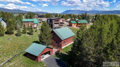 Escape to serene Island Park, Idaho, and stay at our cozy on Island Park Village Resort Golf Course in Idaho - for sale on GolfHomes.com, golf home, golf lot