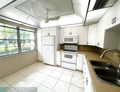 GREAT LOCATION GROUND FLOOR with 2021 A/C and 2023 Water-Heater on Wynmoor Golf Course in Florida - for sale on GolfHomes.com, golf home, golf lot