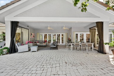 Tropical Oasis awaits! Welcome to your beautiful updated 4 on Boca Grove Golf and Tennis in Florida - for sale on GolfHomes.com, golf home, golf lot