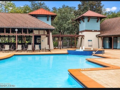 Nice buildable lot available in Wild Heron, a 734-Acre Coastal on Sharks Tooth Golf Club in Florida - for sale on GolfHomes.com, golf home, golf lot