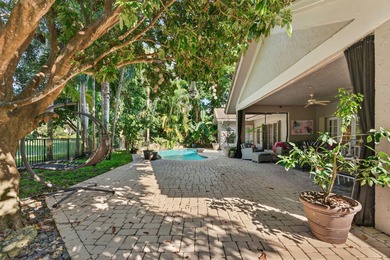 Tropical Oasis awaits! Welcome to your beautiful updated 4 on Boca Grove Golf and Tennis in Florida - for sale on GolfHomes.com, golf home, golf lot