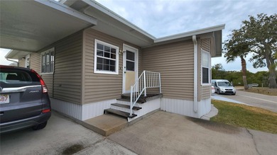 TWO BEDROOM, 1 1/2 BATHROOM MOBILE HOME IN ACTIVE 55+ COMMUNITY on River Run Golf Links in Florida - for sale on GolfHomes.com, golf home, golf lot