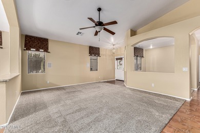 Golf course views, gated active-adult living, and seller-owned on Arizona Traditions Golf Club in Arizona - for sale on GolfHomes.com, golf home, golf lot