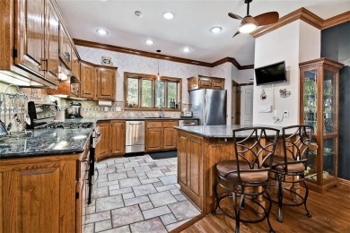 Exquisite custom home w/breathtaking views of forested valley & on Holiday Island Golf Course in Arkansas - for sale on GolfHomes.com, golf home, golf lot