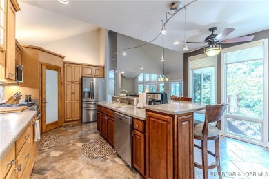 Welcome to this stunning home designed for luxurious living in on Seasons Ridge At Four Seasons in Missouri - for sale on GolfHomes.com, golf home, golf lot