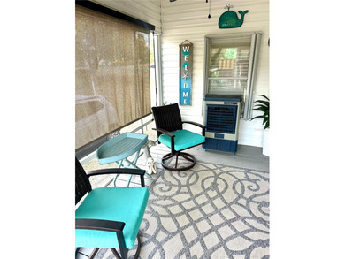 Step into your very own tropical oasis! This backyard is on The Links of Spruce Creek in Florida - for sale on GolfHomes.com, golf home, golf lot