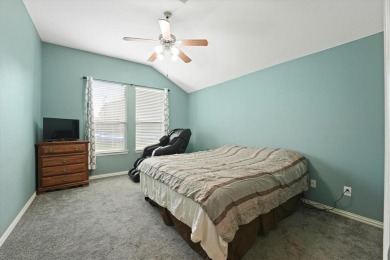 Beautifully designed one-story home offering 3 bedrooms, 2 on Woodbridge Golf Club in Texas - for sale on GolfHomes.com, golf home, golf lot