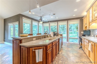 Welcome to this stunning home designed for luxurious living in on Seasons Ridge At Four Seasons in Missouri - for sale on GolfHomes.com, golf home, golf lot