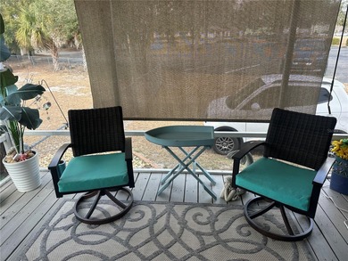 Step into your very own tropical oasis! This backyard is on The Links of Spruce Creek in Florida - for sale on GolfHomes.com, golf home, golf lot