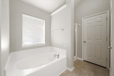 Beautifully designed one-story home offering 3 bedrooms, 2 on Woodbridge Golf Club in Texas - for sale on GolfHomes.com, golf home, golf lot