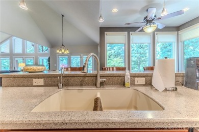 Welcome to this stunning home designed for luxurious living in on Seasons Ridge At Four Seasons in Missouri - for sale on GolfHomes.com, golf home, golf lot