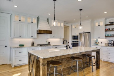 This stunning modern home that sits on over half an acre awaits on Mount Vintage Plantation and Golf Club  in South Carolina - for sale on GolfHomes.com, golf home, golf lot
