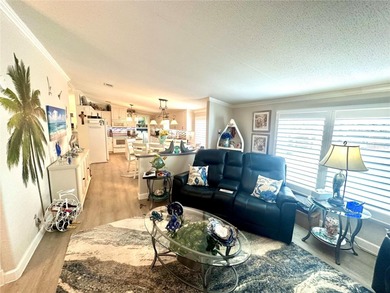 Step into your very own tropical oasis! This backyard is on The Links of Spruce Creek in Florida - for sale on GolfHomes.com, golf home, golf lot