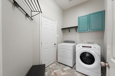 Beautifully designed one-story home offering 3 bedrooms, 2 on Woodbridge Golf Club in Texas - for sale on GolfHomes.com, golf home, golf lot