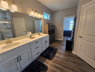 Nearly New and Ready for immediate Move In! This 4 Bedroom, 3 on Plum Brook Country Club in Ohio - for sale on GolfHomes.com, golf home, golf lot