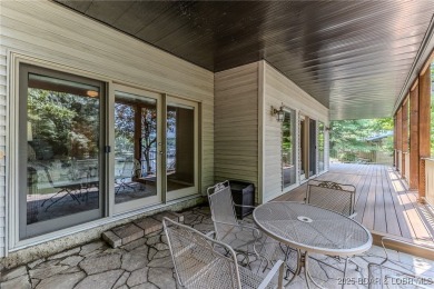 Welcome to this stunning home designed for luxurious living in on Seasons Ridge At Four Seasons in Missouri - for sale on GolfHomes.com, golf home, golf lot
