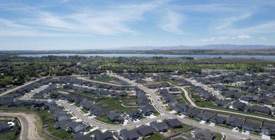 4 bedrooms+an office all on a single level with covered patio on Hunters Point Golf Club in Idaho - for sale on GolfHomes.com, golf home, golf lot