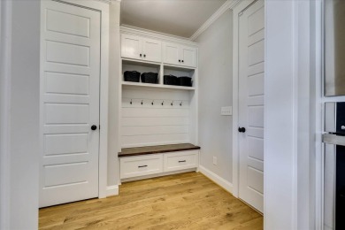This stunning modern home that sits on over half an acre awaits on Mount Vintage Plantation and Golf Club  in South Carolina - for sale on GolfHomes.com, golf home, golf lot