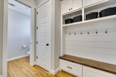 This stunning modern home that sits on over half an acre awaits on Mount Vintage Plantation and Golf Club  in South Carolina - for sale on GolfHomes.com, golf home, golf lot