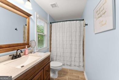 Welcome to your forever home in the heart of Hamilton on Hamilton Mill Golf Club in Georgia - for sale on GolfHomes.com, golf home, golf lot