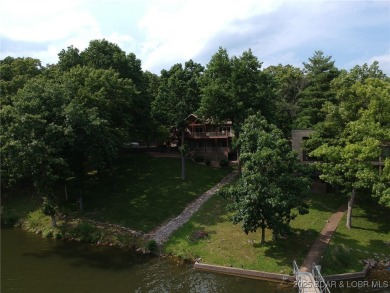 Welcome to this stunning home designed for luxurious living in on Seasons Ridge At Four Seasons in Missouri - for sale on GolfHomes.com, golf home, golf lot