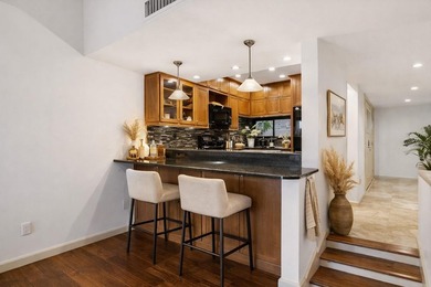 Turnkey Twin Lakes townhome with breathtaking views from BOTH on Carrollwood Country Club in Florida - for sale on GolfHomes.com, golf home, golf lot