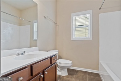 Welcome to 2003 Eagles Ridge, a beautiful Craftsman-style ranch on The Highlands Course at Lake Arrowhead in Georgia - for sale on GolfHomes.com, golf home, golf lot