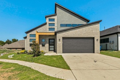 Welcome to 1412 Morris Crossing, a stunning modern home located on Heath Golf and Yacht Club in Texas - for sale on GolfHomes.com, golf home, golf lot