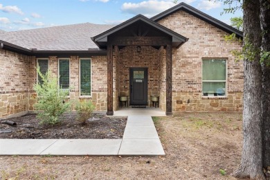 This spacious home boasts an open floor plan, oversized rooms on Sugar Tree Golf and Country Club in Texas - for sale on GolfHomes.com, golf home, golf lot