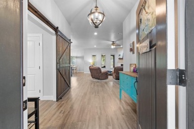 This spacious home boasts an open floor plan, oversized rooms on Sugar Tree Golf and Country Club in Texas - for sale on GolfHomes.com, golf home, golf lot