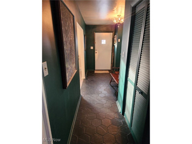 Welcome to this beautiful Colonial-style home ideally located on Henry Stambaugh Golf Course in Ohio - for sale on GolfHomes.com, golf home, golf lot