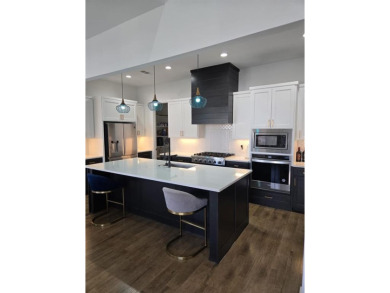 Welcome to 1412 Morris Crossing, a stunning modern home located on Heath Golf and Yacht Club in Texas - for sale on GolfHomes.com, golf home, golf lot