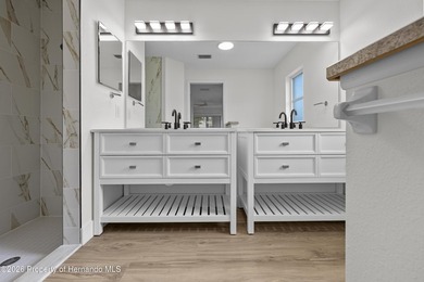 Welcome home to this completely renovated home from top to on Timber Pines Golf Course in Florida - for sale on GolfHomes.com, golf home, golf lot