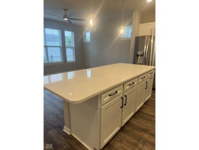 Discover the perfect blend of timeless charm and modern comfort on The Fort Golf Course in Indiana - for sale on GolfHomes.com, golf home, golf lot
