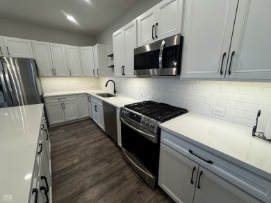 Discover the perfect blend of timeless charm and modern comfort on The Fort Golf Course in Indiana - for sale on GolfHomes.com, golf home, golf lot