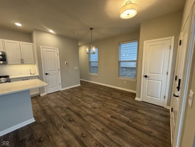 Discover the perfect blend of timeless charm and modern comfort on The Fort Golf Course in Indiana - for sale on GolfHomes.com, golf home, golf lot