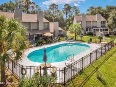 Beautifully Maintained Townhome on the 18th Hole of Cardinal on Diamondhead Country Club in Mississippi - for sale on GolfHomes.com, golf home, golf lot